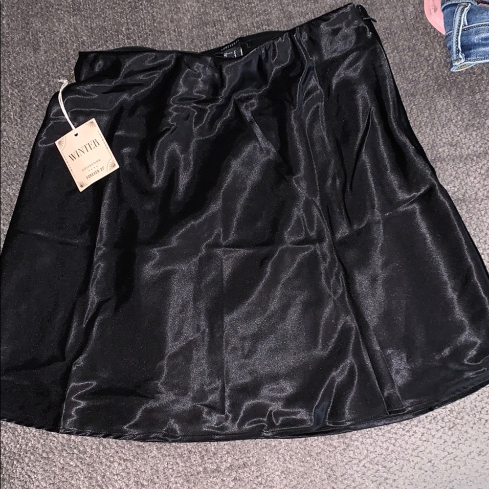 Black silk mini skirt